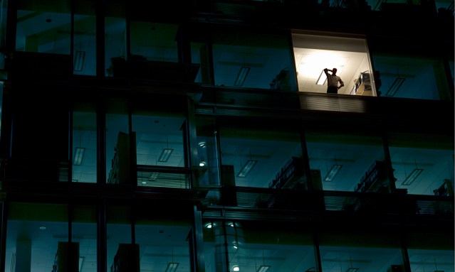 A man in an office at night
