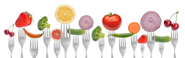 diet concept .vegetables and fruits on the collection of forks